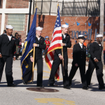 Five Navy soldiers bearing flags during Martin Luther King Day Parade 2014 on E Bay Street