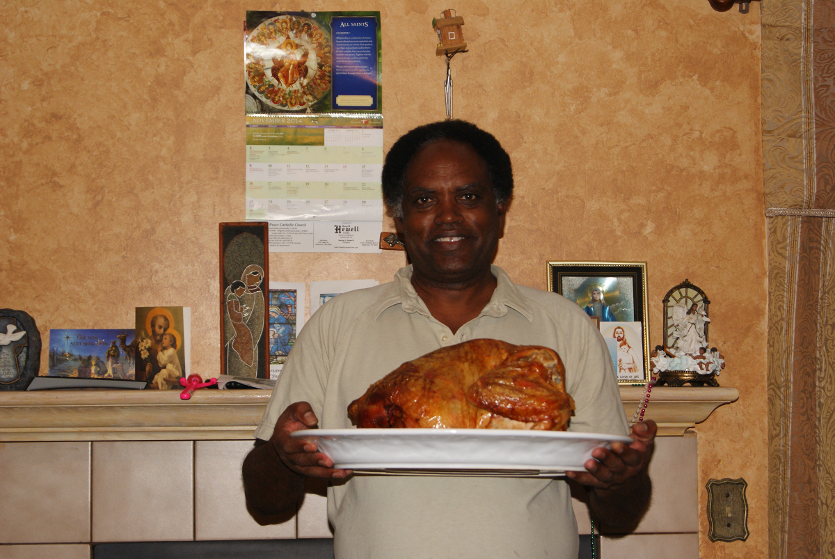 Me holding the turkey on a turkey's charger