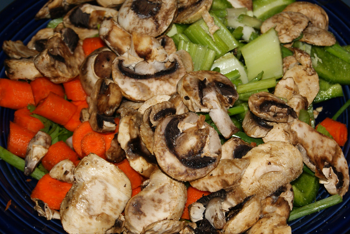 colorful turkey stuffing with celery, carrot,  green paper, and mushroom